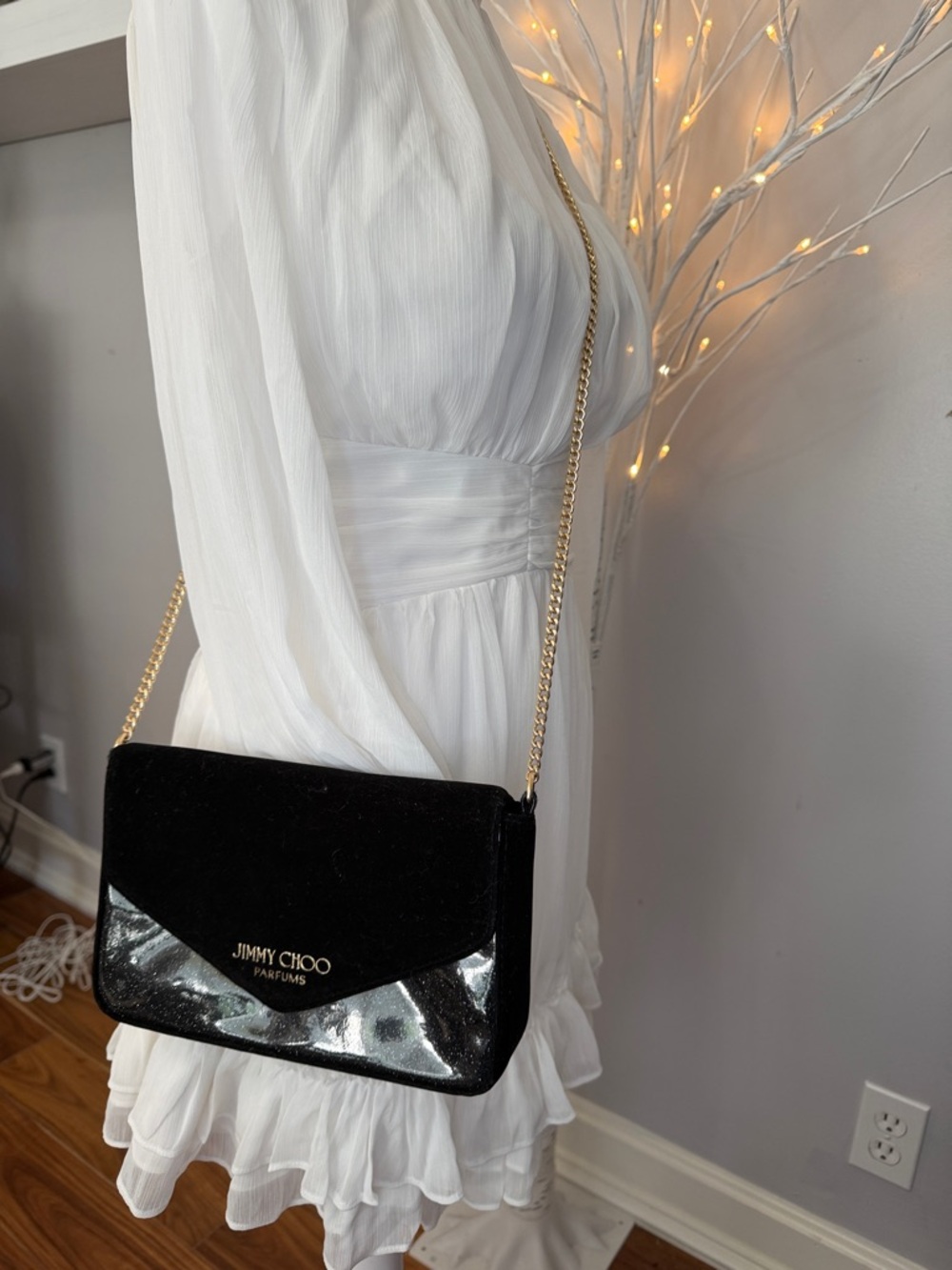 Jimmy Cho NWOT black perfume crossbody with Gold chain. Can be used as clutch!
